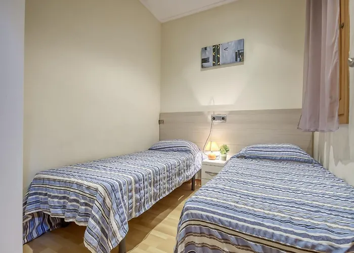 In By The * Росас